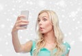 Funny young woman taking selfie with smartphone Royalty Free Stock Photo