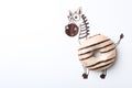 Funny zebra made with donut on background, top view. Space for text