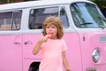 Funy curly child with icecream outdoor. Lovely sweet Caucasian kids outside.
