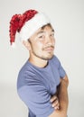 Funy exotical asian Santa claus in new years red Royalty Free Stock Photo