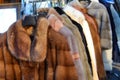 fur Coaat and winter clothing for sale at market Royalty Free Stock Photo