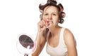 Furious housewife with curlers Royalty Free Stock Photo