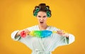 Furious Housewife Shouting Holding Cleaning Feather Duster On Yellow Background Royalty Free Stock Photo