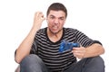 Furious man with a joystick for game console