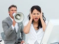 Furious manager shouting through a megaphone Royalty Free Stock Photo