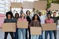 Furious mutiracial group of demonstrators protesting on the street Royalty Free Stock Photo