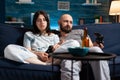 Furious nervous couple losing online videogames championship