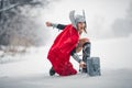 Furious woman in image of Germanic-Scandinavian God of thunder and storm. Cosplay. Royalty Free Stock Photo