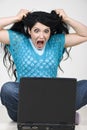 Furious Woman With Laptop Screaming