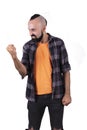 Furious young hispanic man showing power or anger Royalty Free Stock Photo