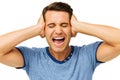 Furious Young Man Covering Ears With Hands Royalty Free Stock Photo