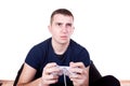 Furious young man with a joystick Royalty Free Stock Photo