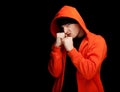 Furious young man in orange sweatshirt Royalty Free Stock Photo