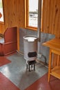 Furnace heating in the old passenger rail car. Novosibirsk Museum of railway equipment, Siberia, Russia