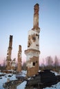 The furnace and the tubes of the ashes of the burned house at sunset. Russia Royalty Free Stock Photo