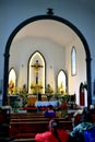 Worshipers in the church of Igreja de Saint Nicolau