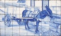 Antique style blue Portuguese wall tiles Azulejo with a donkey harnessed to a cart painted on it