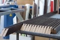 Furniture accessories. Manufacture of skirting boards in a furniture factory. Royalty Free Stock Photo