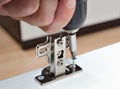 Furniture assembly, installation of door hinges, screws screwed Royalty Free Stock Photo