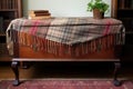 furniture blanket draped over an antique bureau Royalty Free Stock Photo