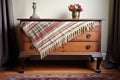 furniture blanket draped over an antique bureau Royalty Free Stock Photo