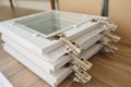 Furniture details close-up, installation of cabinet glass doors Royalty Free Stock Photo