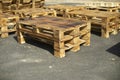 Furniture made of planks on street. Wooden pallets. Made of planks Royalty Free Stock Photo