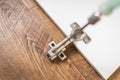 Furniture repair, cabinet door hinges Royalty Free Stock Photo