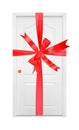 Furniture - White inside door gift tied red bow in the orange ha Royalty Free Stock Photo