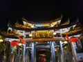 Furong Ancient Town illuminated at night.