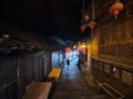 Furong Ancient Town illuminated at night.