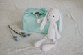 Furoshiki Japanese Gift fabric Wrapping and knitted toy rabbit. Zero waste, eco-friendly gift wrapping box. Fall hand Royalty Free Stock Photo