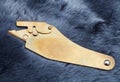 Furrier's knife on sheepskin Royalty Free Stock Photo