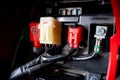 Close up Fuse panel on battery box of motor cycle and plug and power supply cable Royalty Free Stock Photo