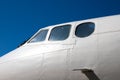 Fuselage cockpit. Part of the aircraft. The nose of the aircraft against the blue sky Royalty Free Stock Photo