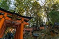 Fushimi Inari Taisha Shrine in Japan, adorned with vibrant red Tori gates Royalty Free Stock Photo