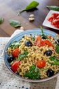 Fusilli lunghi ,cherry tomato, black olive and spinach Royalty Free Stock Photo