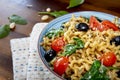 Fusilli lunghi ,cherry tomato, black olive and spinach Royalty Free Stock Photo