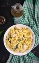 Fusilli pasta with a creamy sauce with chicken meat, parmesan cheese and spinach Royalty Free Stock Photo