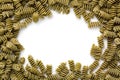 Fusilli pasta frame isolated on white background