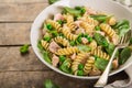 Fusilli pasta with salmon, spinach and grean peas Royalty Free Stock Photo