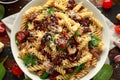 Fusilli Pasta with sun dried tomatoes, mushrooms, parmesan cheese and spinach. healthy food. Royalty Free Stock Photo