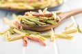 Fusilli pugliesi. Italian twisted pasta on wooden spoon Royalty Free Stock Photo