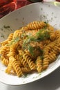 Fusilli with tomato sauce and herb