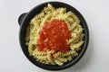 Fusillis with tomato sauce served in plastic dish Royalty Free Stock Photo