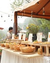 Fusion cuisine booth at an international culinary fair in a city market