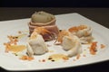 Fusion cuisine dish - shrimps, fish, carrots