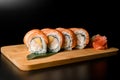Fusion rolls. fish, shrimp, and mango delight. Royalty Free Stock Photo