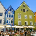 FUSSEN, Germany- June 11, 2017: The Wonderful Historical Town Fuessen in Bavaria with People sitting at a Cafe