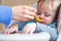 Fussy Baby Boy In High Chair Refusing Food At Meal Time Royalty Free Stock Photo